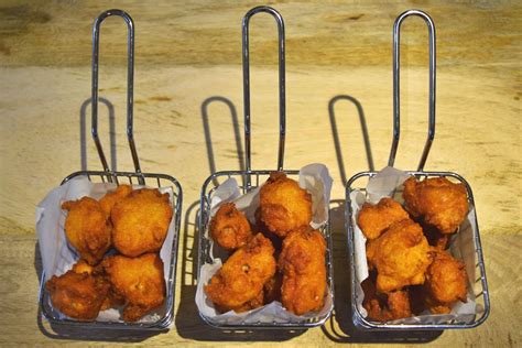 These savory hush puppies feature the goodness of sweet corn and a hint of onion—a true bake: Hush Puppies Recipe | Burning Brisket | Barbecue Everything | Recipe | Barbecue recipes sides ...