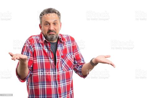 Man Making Confused Expression And Gesture Stock Photo Download Image