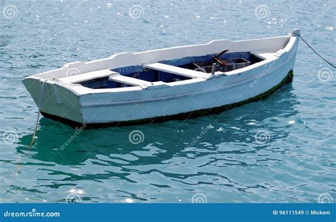 Boat Tied With A Rope On A Mooring Stock Image