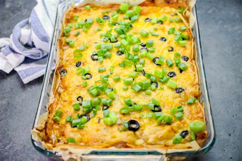 This cheesy chicken enchilada casserole is the perfect dish for busy weeknights. Layered Chicken Enchilada Casserole : Skinny Chicken ...