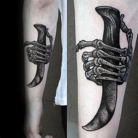 Is it possible to put a lasting tattoo on a bone rather than skin? Skeleton hand with sharp dagger tattoo on forearm in old school style - Tattooimages.biz