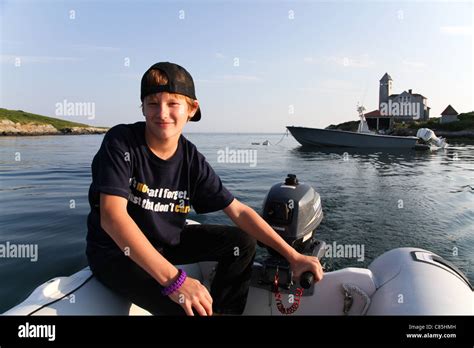 Boy In A Boat Stock Photo Alamy