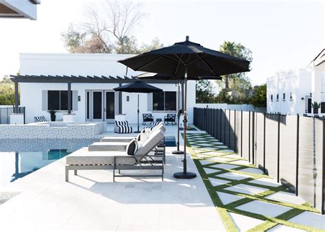 Lounge Chairs On Black And White Pool Deck Hgtv