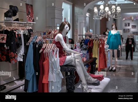 Clothes Shop Interior Woman Dress Shop With Female Mannequins Stock