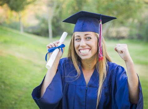 Proud Teen Graduate Holding Diploma In Cap And Gown Stock Photo Image