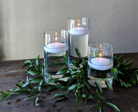 Sadies Floral Cylinders With Floating Candles And Greenery