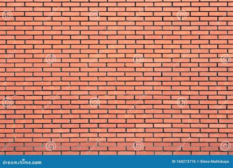 Brick Wall Of Bright Orange Color Texture Background Stock Photo