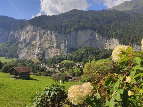 Lauterbrunnen A Picturesque Village With Its Log Cabins Between Two