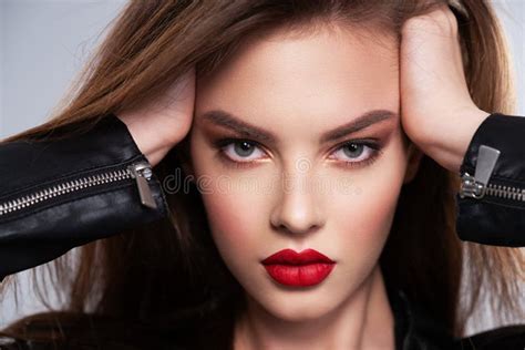Portrait Of Beautiful Young Woman With Bright Makeup Beautiful Brunette With Bright Red