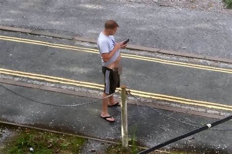 Bloke Caught Having A Hands Free WEE On Street While Using His Phone Daily Star