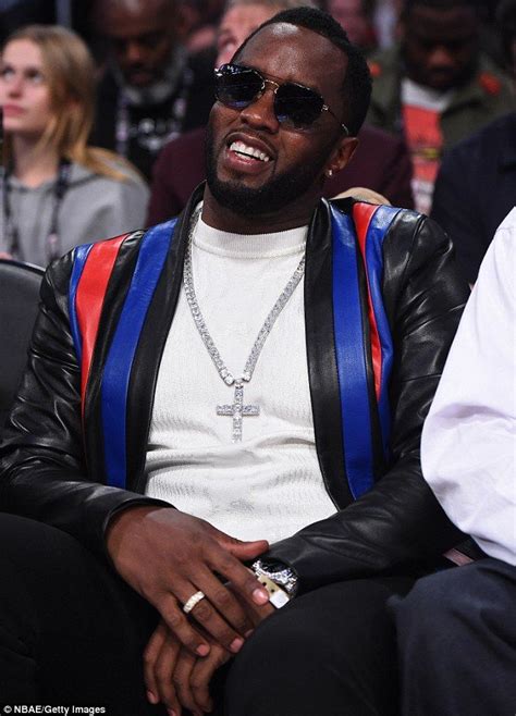 Diddy Cozies Up With Cassie As She Flashes Thigh At Nba Game In La Thighs Making The Band