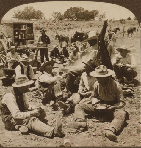 Cowboys At Dinner Scene At Noon Hour In A Typical Cowboy Camp Of The