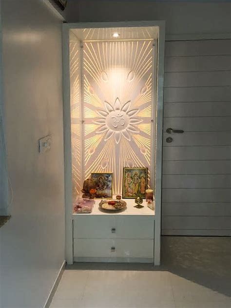 White Coloured Wooden Finish Unit For 🙏 Pooja Room Highlighted By Spot