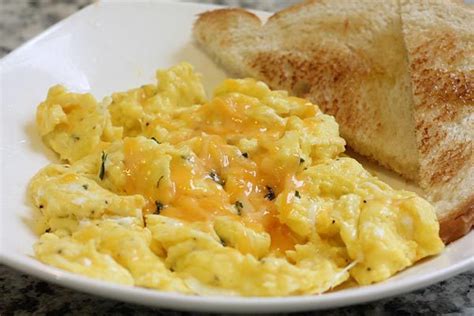 The Best Cheesy Eggs Scrambled Eggs With Lots Of Cheddar Cheese