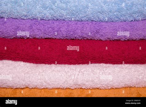 Pile Of Rainbow Colored Towels Isolated Stock Photo Alamy