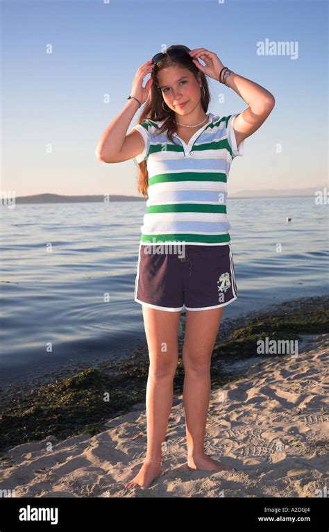 15 Year Old Girl At Beach Looking Into Camera At Beach Stock Photo Alamy