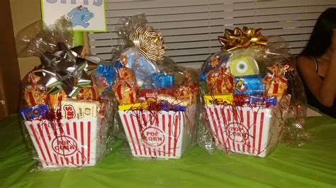 Easy diy baby shower prizes. Diaper raffle prizes. Movie tickets, popcorn, and candy! | diaper raffle prize ideas | Pinterest ...