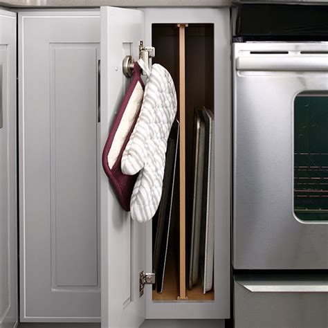 A organizer with a shelf and storage area to store cookware safely in the. Cabinet Storage Buying Guide | Kitchen cabinet storage ...