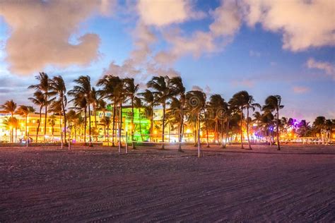 Ocean Drive Miami Beach At Sunset City Skyline With Palm Trees At Dusk Art Deco On The South