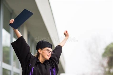 Pretty Young Woman Celebrating Joyfully Her Graduation Stock Image