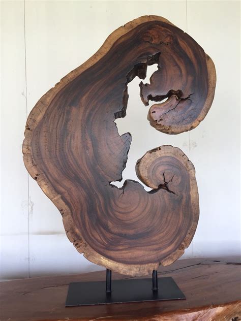 Appreciate The Beauty Of Natural Wood Grain On These Wood Sculptures