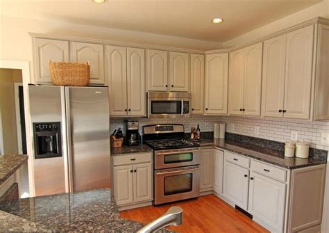 White Kitchen Cabinets With Baltic Brown Granite