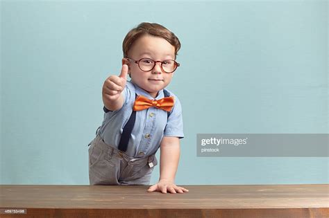 Portrait Of Happy Little Boy Giving You Thumbs Up High Res Stock Photo