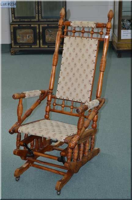 Antique Glider Rocker With Upholstered Seat And Back Purportedly Made
