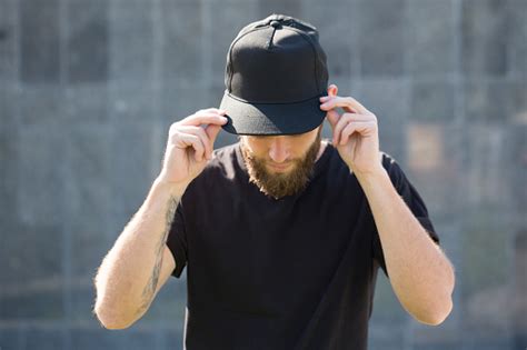 Male modeling, where should i begin? Hipster Handsome Male Model With Beard Wearing Black Blank Baseball Cap With Space For Your Logo ...