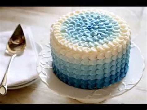 To make cake designs with icing, first make buttercream frosting, which is good for decorating. DIY Cake decorations ideas for men - Free Cake Videos