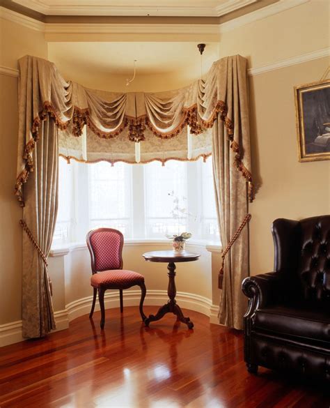 Bay Window With Swags And Tails And Matching Drapes And Blinds