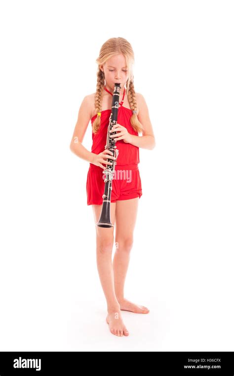 Young Girl In Red Playing Clarinet Stock Photo Alamy