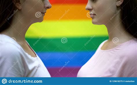 Lesbian Couple Against Rainbow Flag Background Same Sex Relations