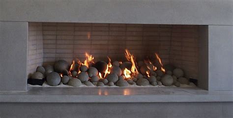 .a fire, upgrading your fireplace with gas burning logs can be an easy and affordable solution. Beach Sand with smooth stones | Gas fireplace logs, Indoor ...