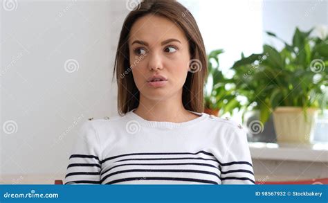 Beautiful Young Woman Confused And Scared Of Problems Stock Photo