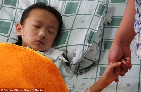 Chinese Girl Successfully Undergoes Surgery To Remove 33 Pound Tumour