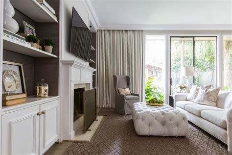 Neutral Transitional Sitting Room With White Ottoman Hgtv