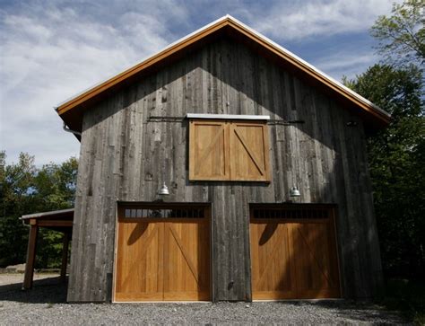 In some cases (usually 7′ or 8′ heights), 20′ width residential doors are available. I love the color mix on this barn/garage and the use of ...