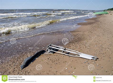 Pair Crutches On Beach Sand Near Sea Royalty Free Stock Photo Image