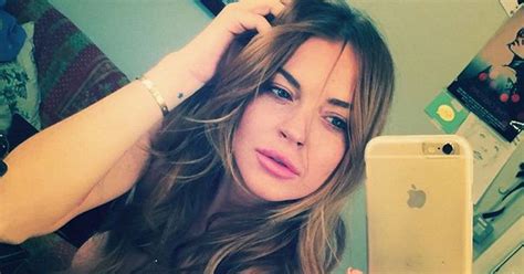 Lindsay Lohan Posts Topless Selfie Covering Her Boobs With Nothing But