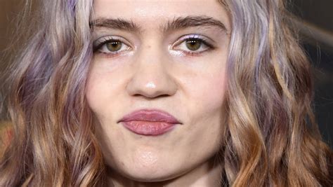 The Bizarre Surgical Procedure Grimes Had Done On Her Eyes