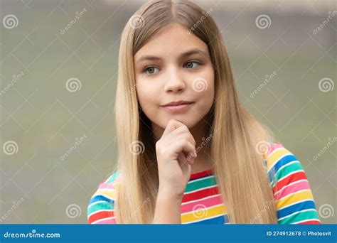 Portrait Of Thoughtful Teen Girl With Blonde Hair Portrait Of Teen