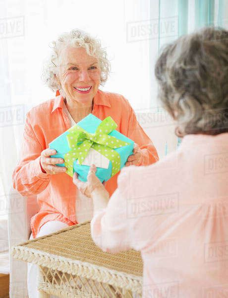 Two Senior Women Celebrating Birthday Stock Photo Dissolve
