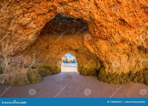 Famous Caves In A Beach Rock Formation In The Algarve Portugal