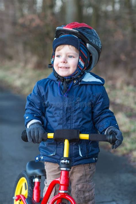 2 Years Old Toddler Riding On His First Bike Stock Image Image Of