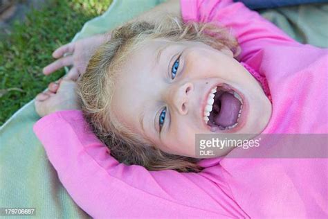 Girls Open Mouth Bildbanksfoton Och Bilder Getty Images