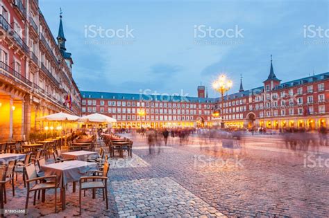 Madrid is a city of contrasting styles, reflecting clearly the different periods in which change and development took place. Plaza Mayor In Madrid Spain Stock Photo - Download Image ...