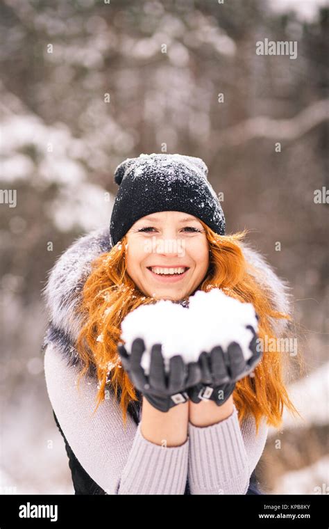 Winter Beautiful Girl Outdoor Portrait With Snow In Hands Young Woman