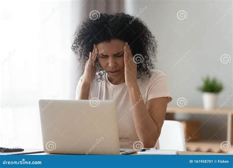 Unwell Black Girl Massage Head Suffering From Headache Stock Image