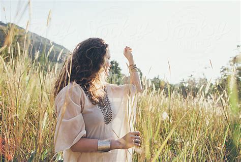 Hippie Woman Praying In Nature By Visualspectrum Stocksy United